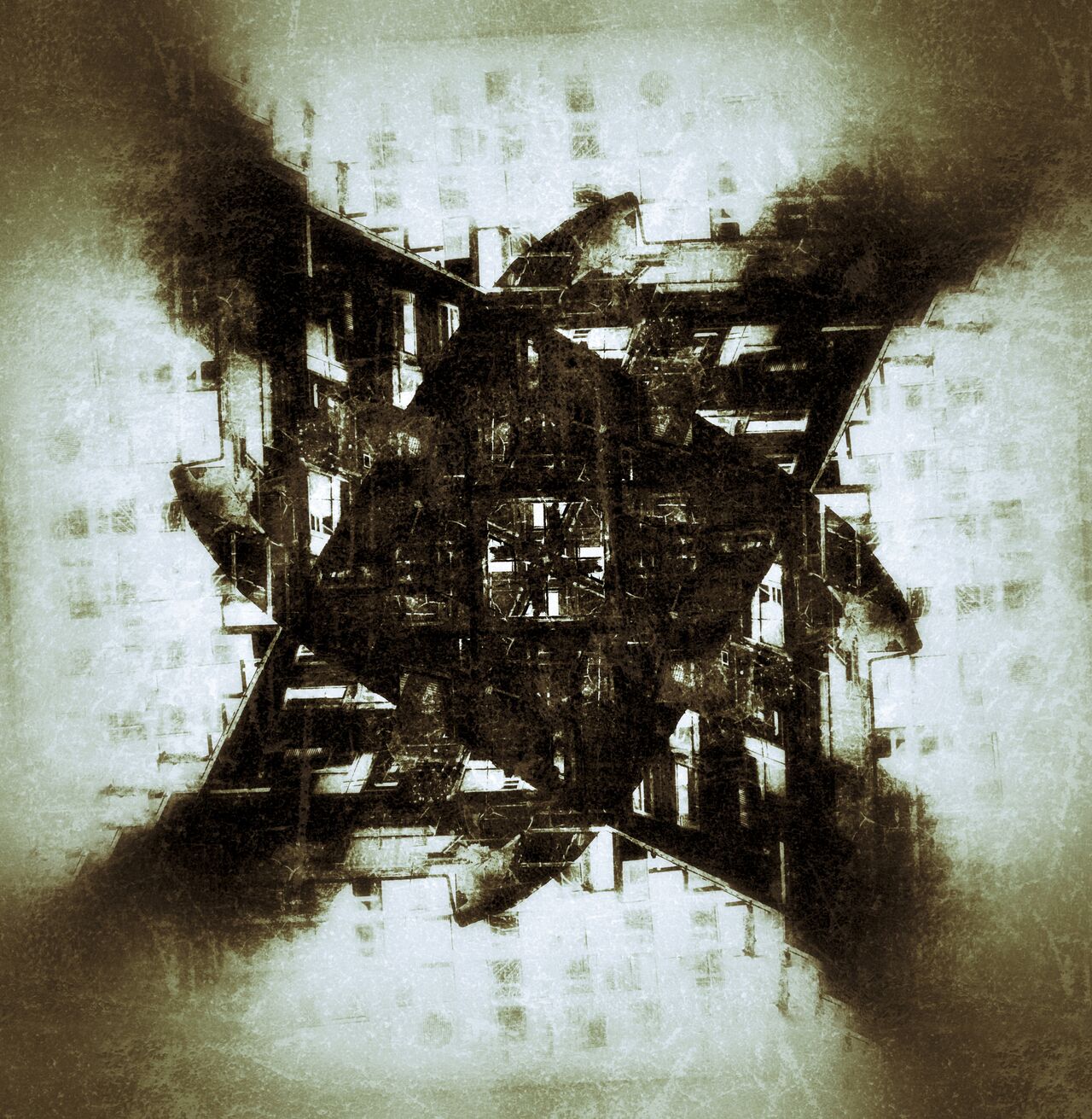 Abstrakte kreuzförmige Struktur wie durch ein Kaleidoskop gesehen in monochromen, graubraunen Farbtönen.
